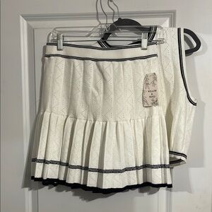 White Pleated Skirt Set with Cropped sleeveless top. Ivory